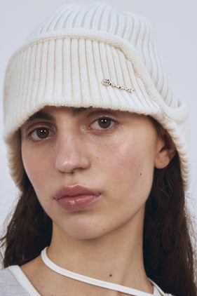 Enavant MERINO WOOL EARFLAP KNIT BEANIE in the color Ivory